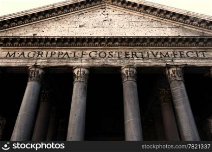 Image of the facade of the Pantheon in Rome, Italy. Shot with wide angle lens at a low angle.