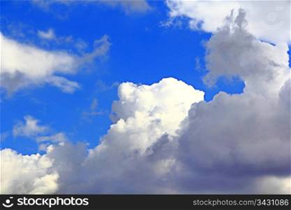 Image of the summer fluffy blue sky