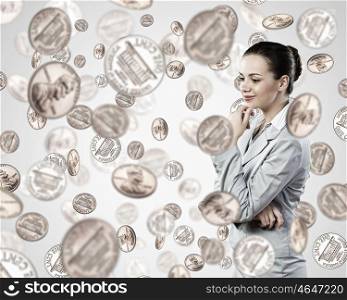 Image of thoughtful businesswoman standing under coin rain. How to earn more