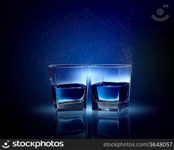 Image of two glasses of blue liquid