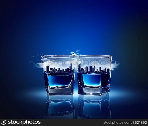 Image of two glasses of blue liquid with city illustration in