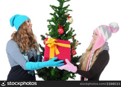 Image of two young women with a New Year gift. Isolated on white background