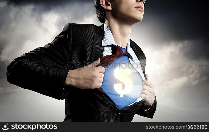 Image of young businessman in superhero suit with dollar sign on chest