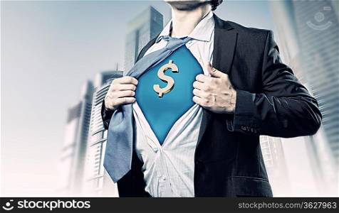 Image of young businessman in superhero suit with dollar sign on chest