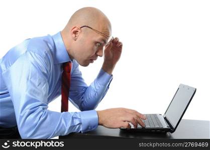 Image surprised businessman looking at computer monitor. Isolated on white background
