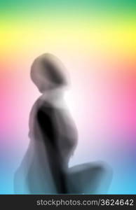 Image with a blurred female silhouette against colour background