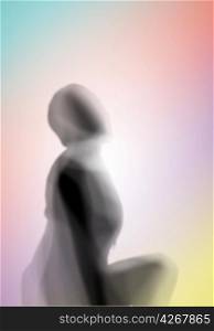 Image with a blurred female silhouette against colour background