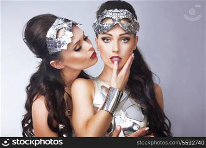 Imagination. Pair of Styled Women in Futuristic Silver Glasses