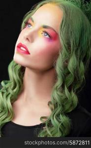 Imagination. Woman with Dyed hair and Fancy Creative Makeup