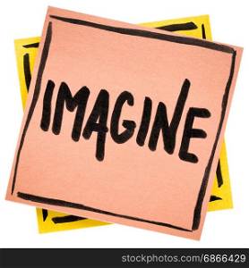 Imagine advice or reminder - handwriting in black ink on an isolated sticky note