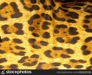 Imitation of leopard leather as a background
