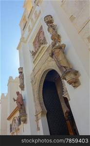 Impressive entrance to the cathedral of La Giralda in Seville, Spain