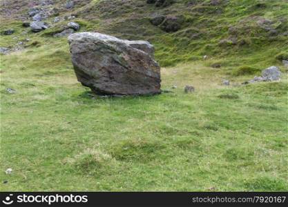 In 1836 this boulder rolled down and demolished a chapel. Drws-y-coed Valley, Snowdonia National Park, Gwynedd, Wales, United Kingdom.