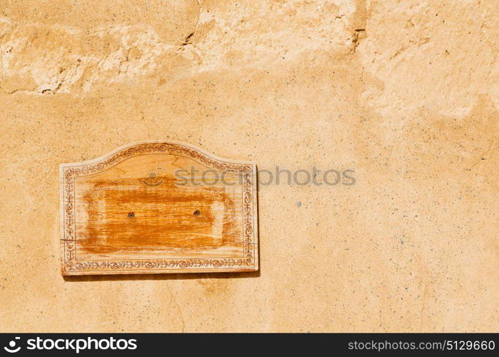 in a concrete wall the wooden vintage empty panel blank and abstract