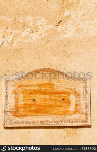 in a concrete wall the wooden vintage empty panel blank and abstract