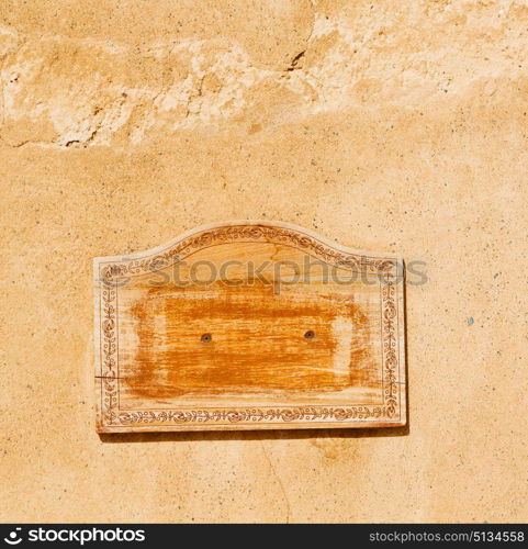 in a concrete wall the wooden vintage empty panel blank and abstract