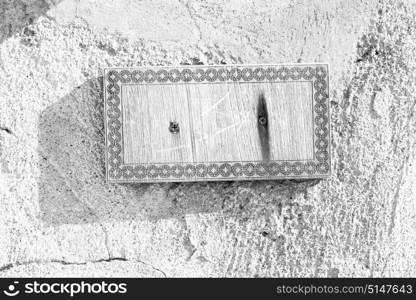 in a concrete wall the wooden vintage empty panel blank and abstract