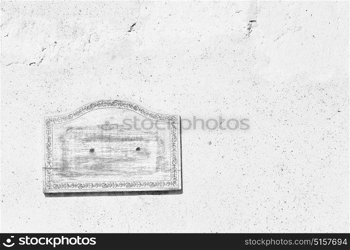 in a concrete wall the wooden vintage empty panel blank and abstract