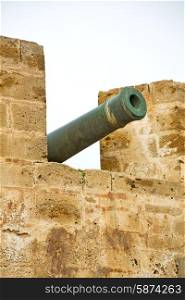 in africa morocco green bronze cannon and the blue sky