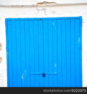 in africa morocco old harbor wood door and the blue sky