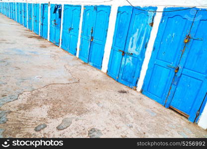 in africa morocco old harbor wood door and the blue sky