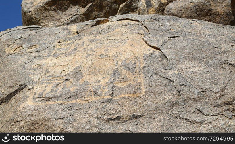 in africa sudan sebu  the antique hieroglyphics of the black pharaohs in the rock near the nile
