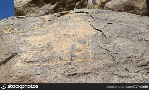 in africa sudan sebu  the antique hieroglyphics of the black pharaohs in the rock near the nile
