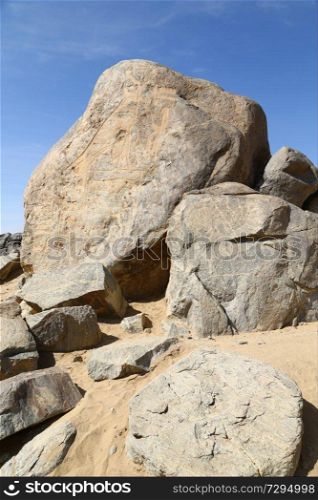 in africa sudan sebu  the antique hieroglyphics of the black pharaohs in the rock near the nile

