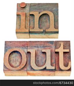in and out - isolated words in vintage letterpress wood type