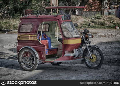 in asia philipphines the typical tuk tuk motorbike for tourist