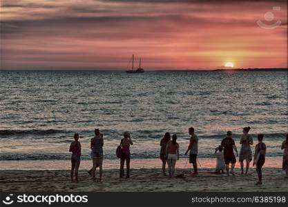 in austalia the bay of darwin in the sunrise and silhouette people