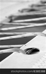 in australia abstract texture of the plastic blanket and rope of a catamaran