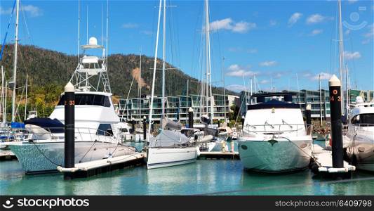 in australia Airlie Beach and the boat in the pier near ocean