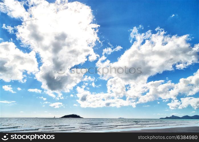in australia beach and the clouds in the sky with sunlight
