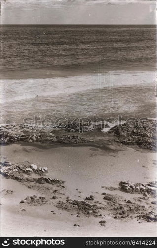 in australia fraser island the beach near the rocks in the wave of ocean