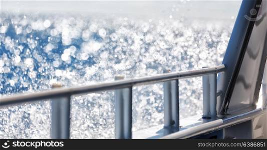 in australia the bokeh of light from the railings boat and ocean