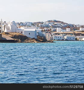 in cyclades island harbor and boat santorini naksos europe house construction old history