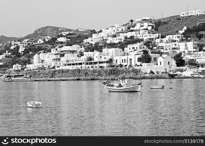 in cyclades island harbor and boat santorini naksos europe house construction old history