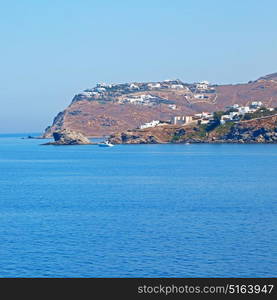 in cyclades island harbor and boat santorini naksos europe house construction old history