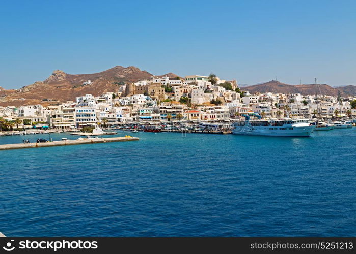 in cyclades island harbor and boat santorini naksos europe house construction old history