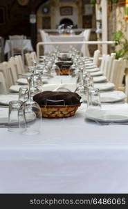 in cyprus the table of the elegant restaurant and empty ready for the party. the table of the elegant restaurant