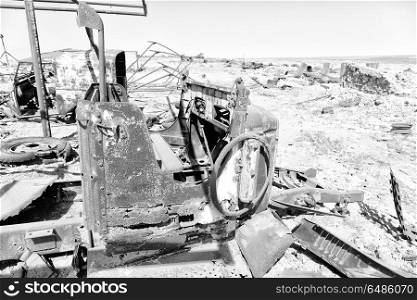 in danakil ethiopia africa in the old italian village rusty antique car and hot. in the old village rusty antique car and hot