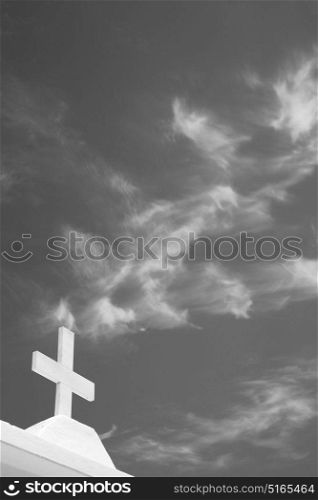 in europe greece a cross the cloudy sky