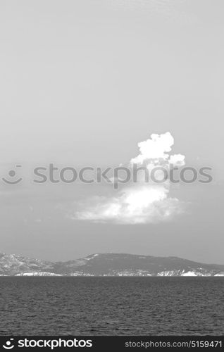 in europe greece santorini island hill and rocks on the summertime beach