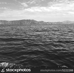 in europe greece santorini island hill and rocks on the summertime beach