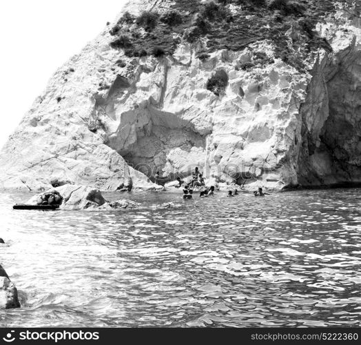 in europe greece santorini island hill and rocks on the summertime beach