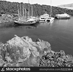 in europe greece santorini island hill and rocks on the summertime beach