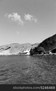 in europe greece santorini island hill and rocks on the summertime beach