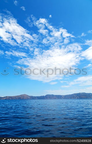 in europe greece santorini island hill and rocks on the summertime beach