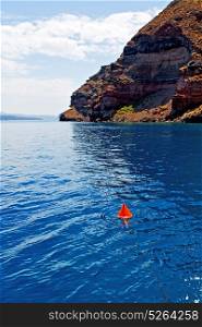 in europe greece santorini island hill and rocks on the summertime beach